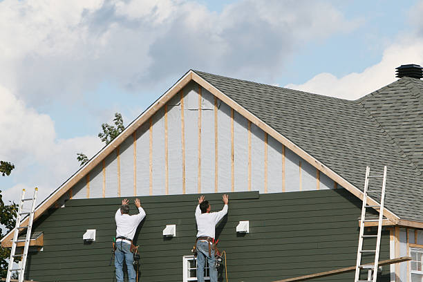 Professional Siding technician working in Parksley, VA